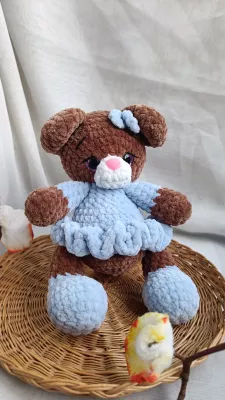 Crocheted bear in a dress