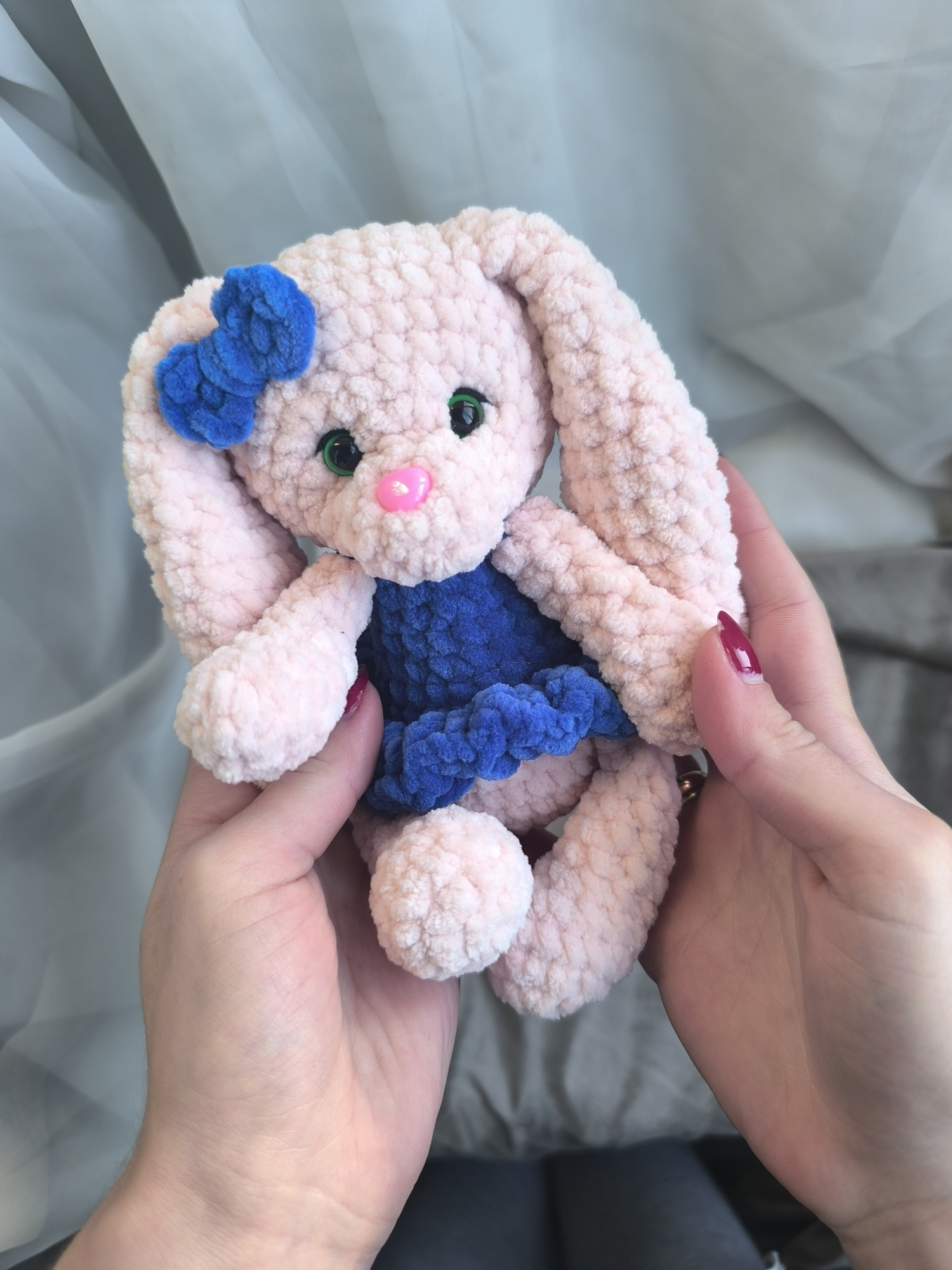 Little bunny in a blue dress